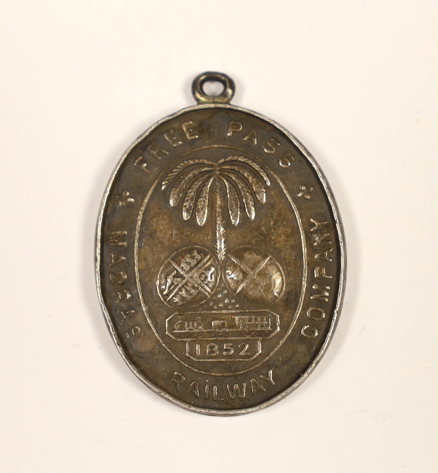 A scarce ‘Madras Railway Company free pass’ medallion, dated 1852, engraved ‘No125 ASST. TRAFFIC MANAGER’